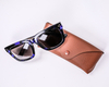 2021 Glasses Case A Brown Glasses Case with A LOGO Printed on It Looks Like A Leather Wallet