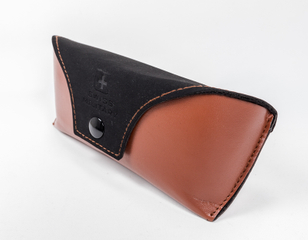 A Brown And Black Eyeglass Case with A LOGO Printed on It Looks Like A Leather Wallet